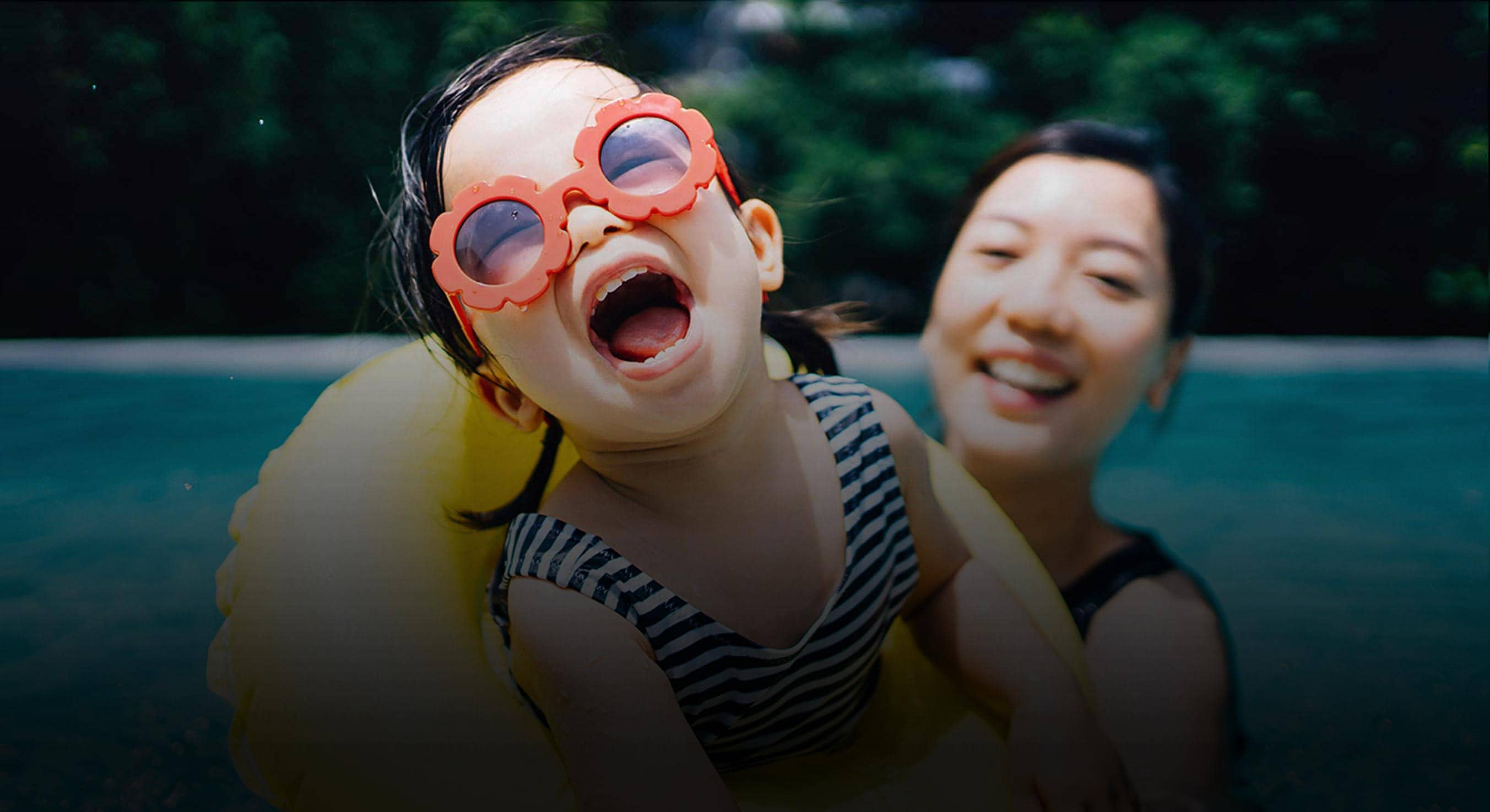 Mom and daughter in the pool