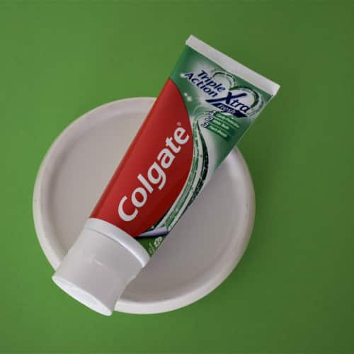 Colgate Triple Action Xtra Fresh tandpasta tube